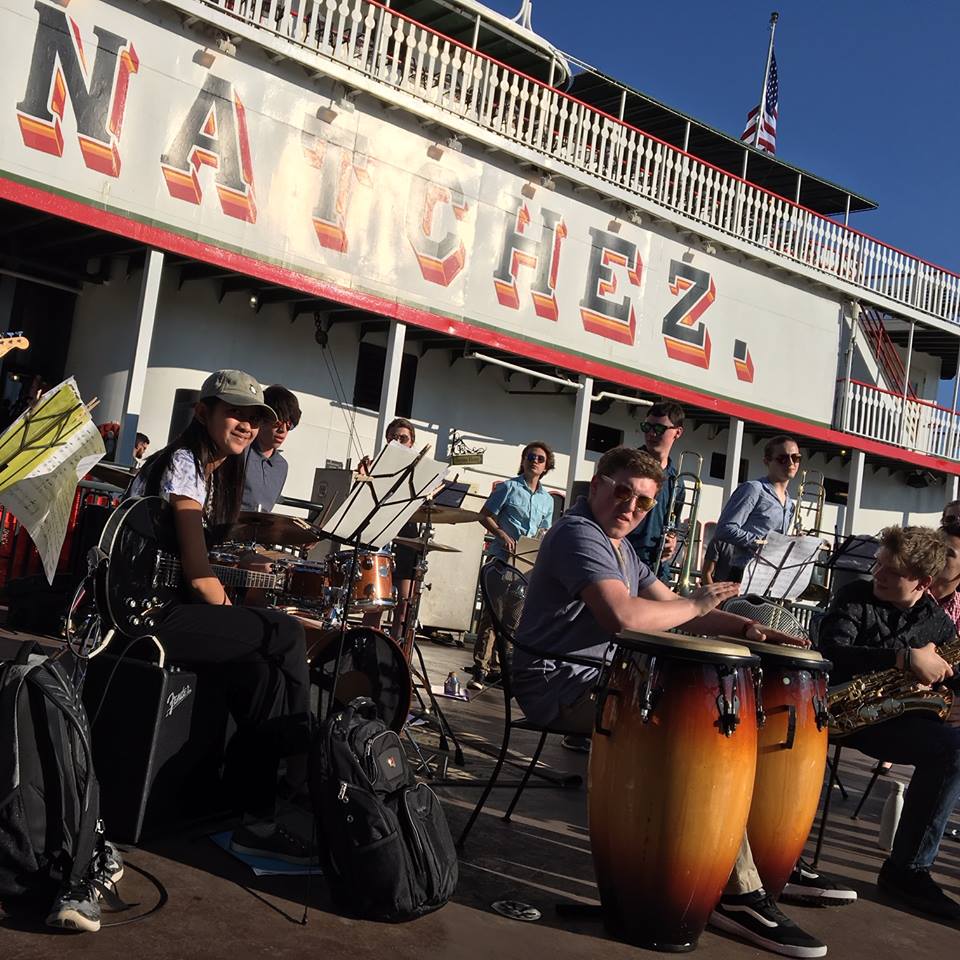 Band students perform outside the Natchez Steam Boat